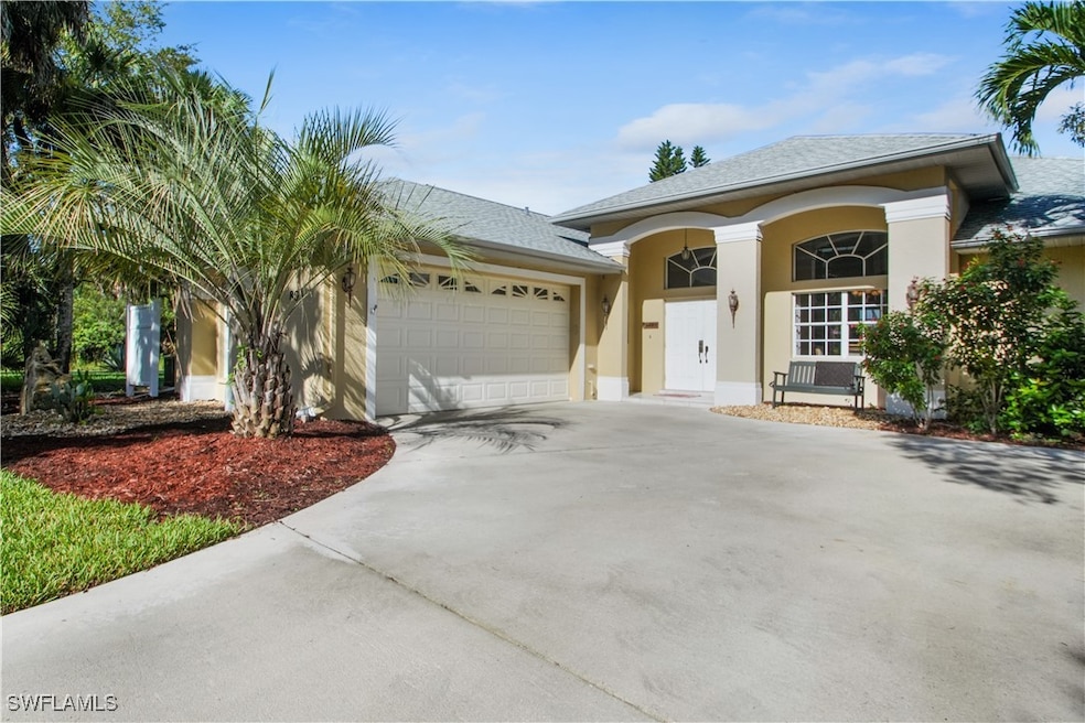 Single story home featuring a garage