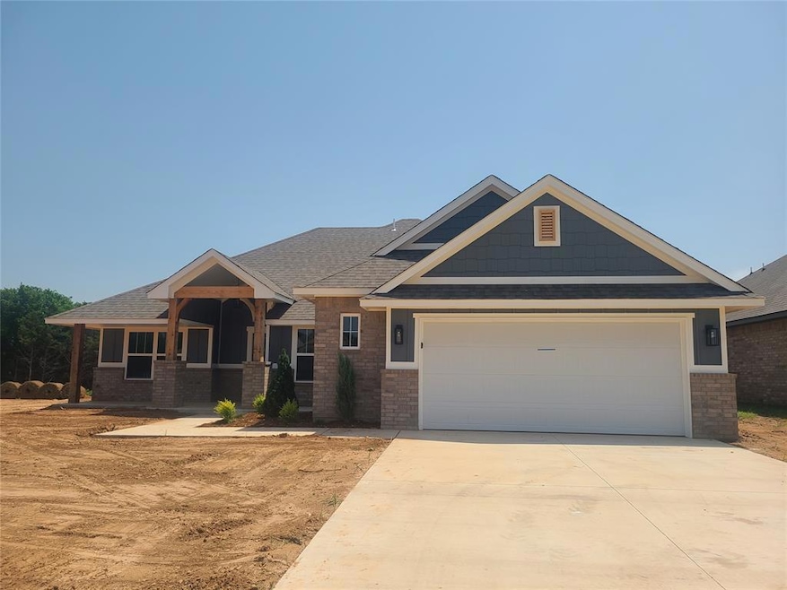 Craftsman-style home featuring a garage