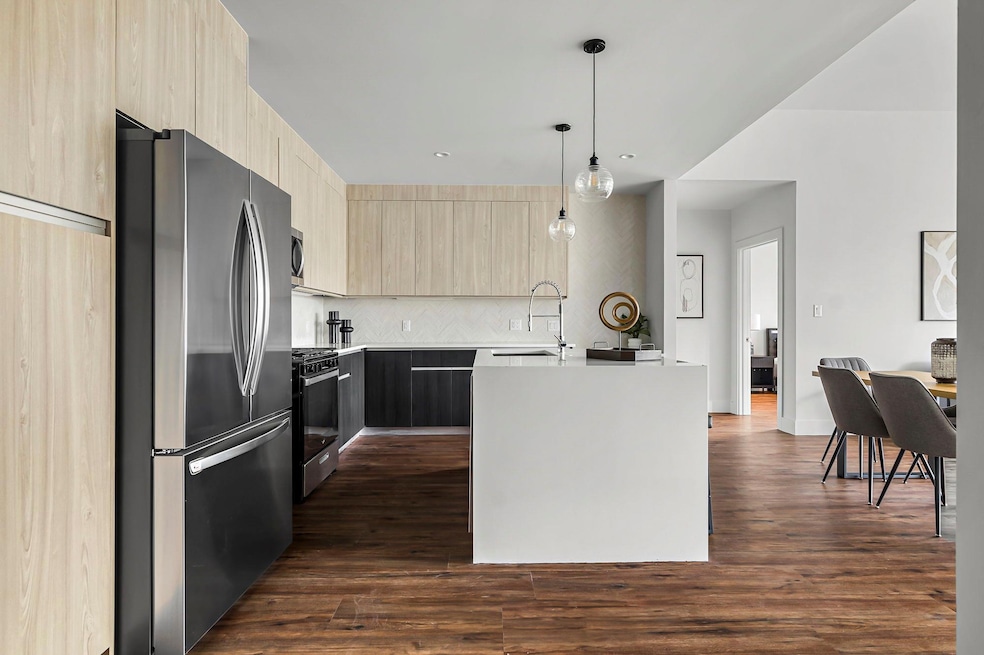 Kitchen with modern cabinets, light brown cabinet