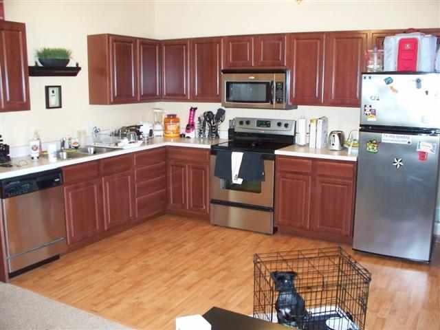 Heated floors, Stainless appliances, Rich cherry w