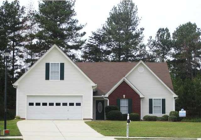 Exterior Front. Beautiful 4 Bedroom ranch on woode