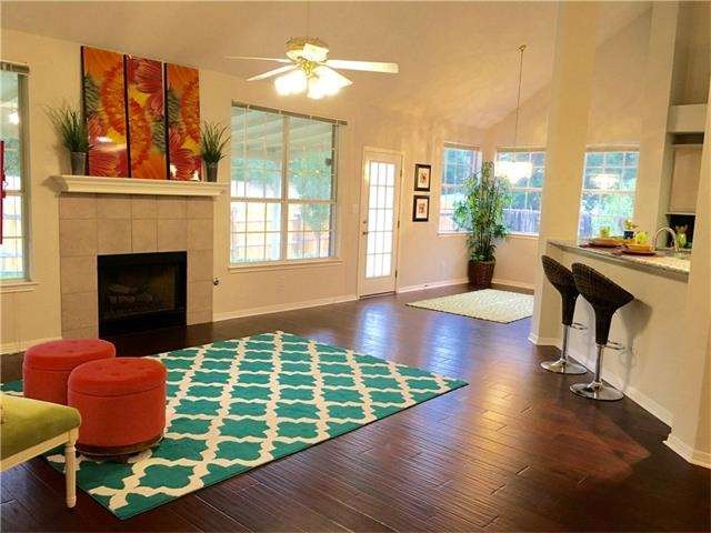 Open living/dining/kitchen and a cozy fireplace - 