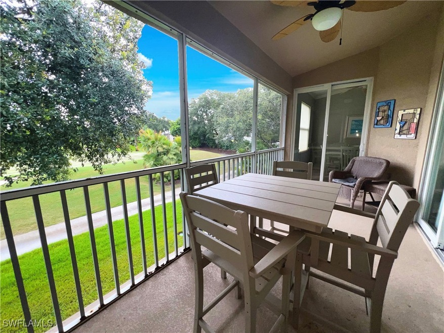 Sunroom featuring ceiling fan and lofted ceiling