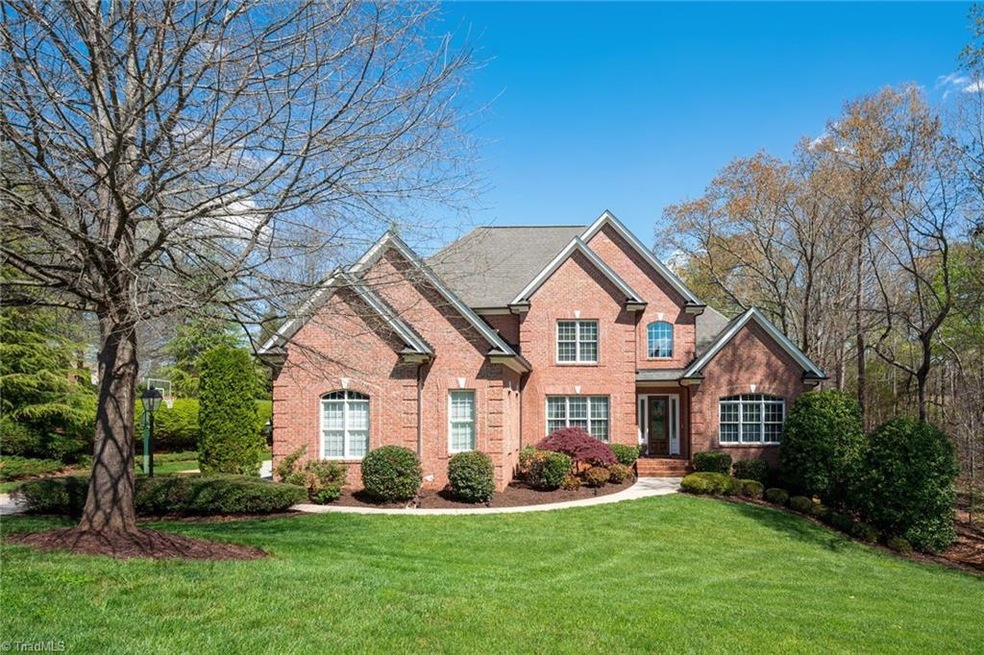 Handsome home on over 1.5 acres in the heart of The Vineyards at Summerfield