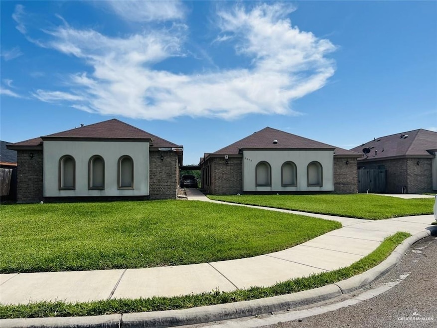 Mediterranean / spanish-style home with stucco siding and brick siding