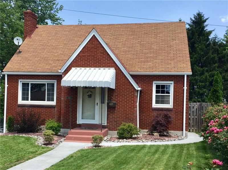 Solid brick cape in move-in condition.....larger t