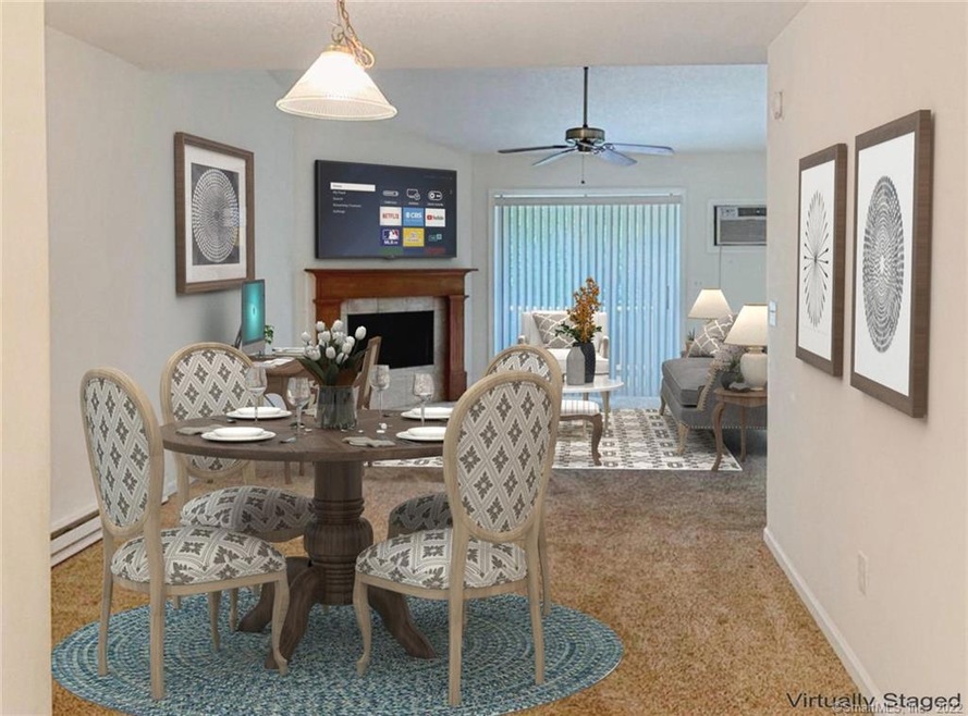 Living room/Dining room combo with fireplace