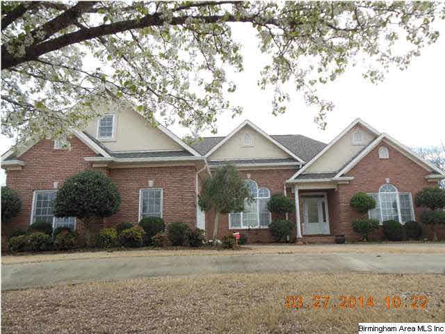 Front view of 466 Marsh Ln.  Notice the roof is on