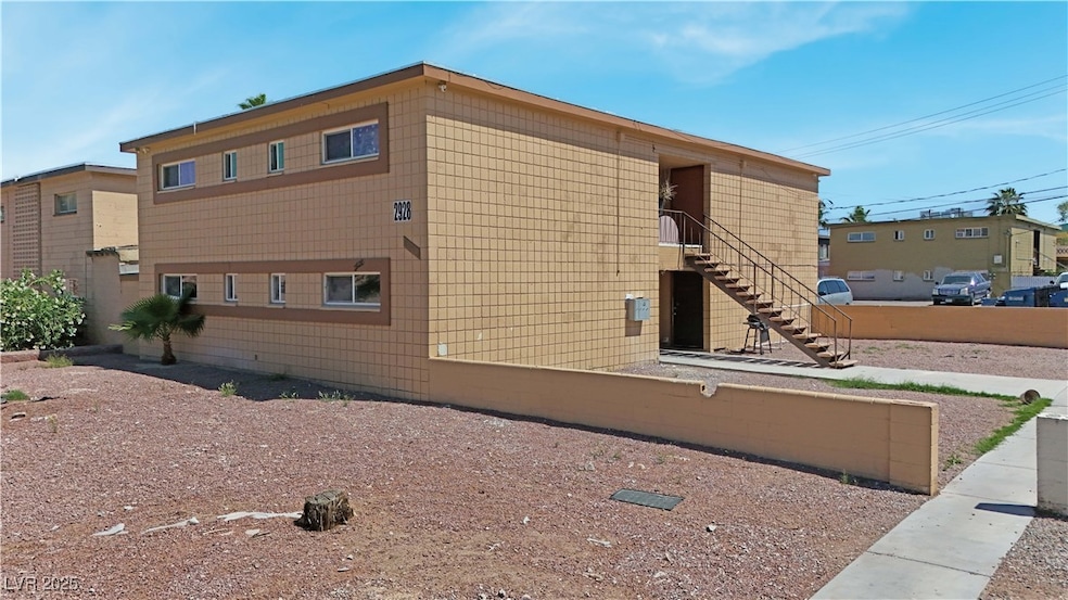 View of side of home with stairway