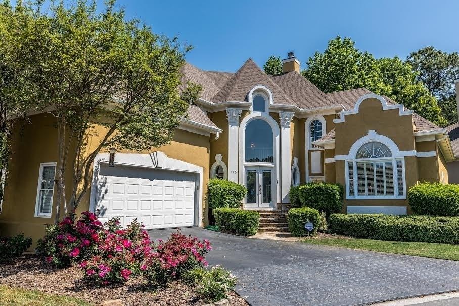 Grand european open floor plan Hardcoat stucco hom