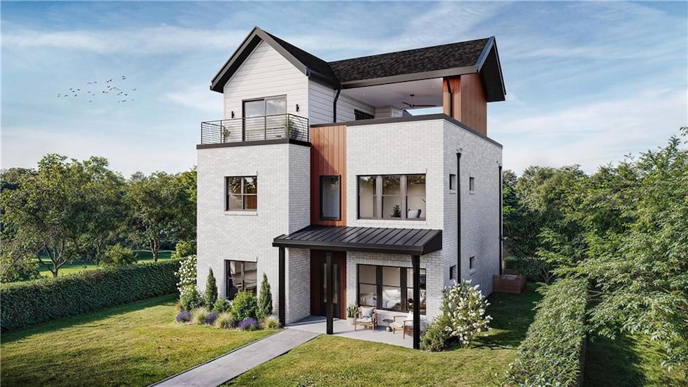 Contemporary house with a standing seam roof, a pa