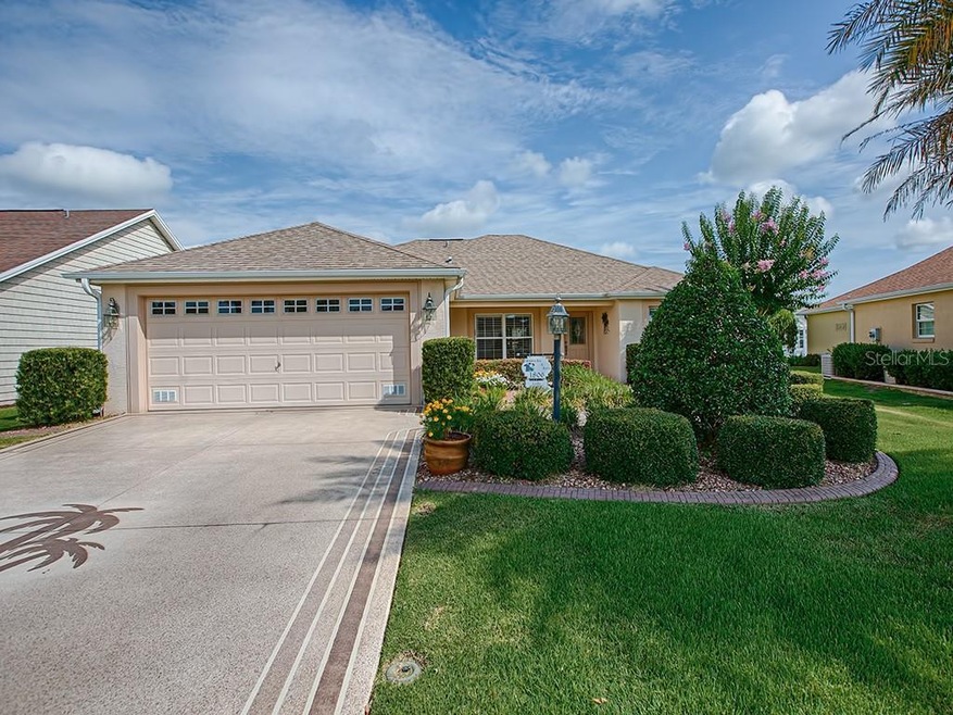 LOVELY CURB APPEAL WITH PAINTED DRIVE AND WALKWAY,