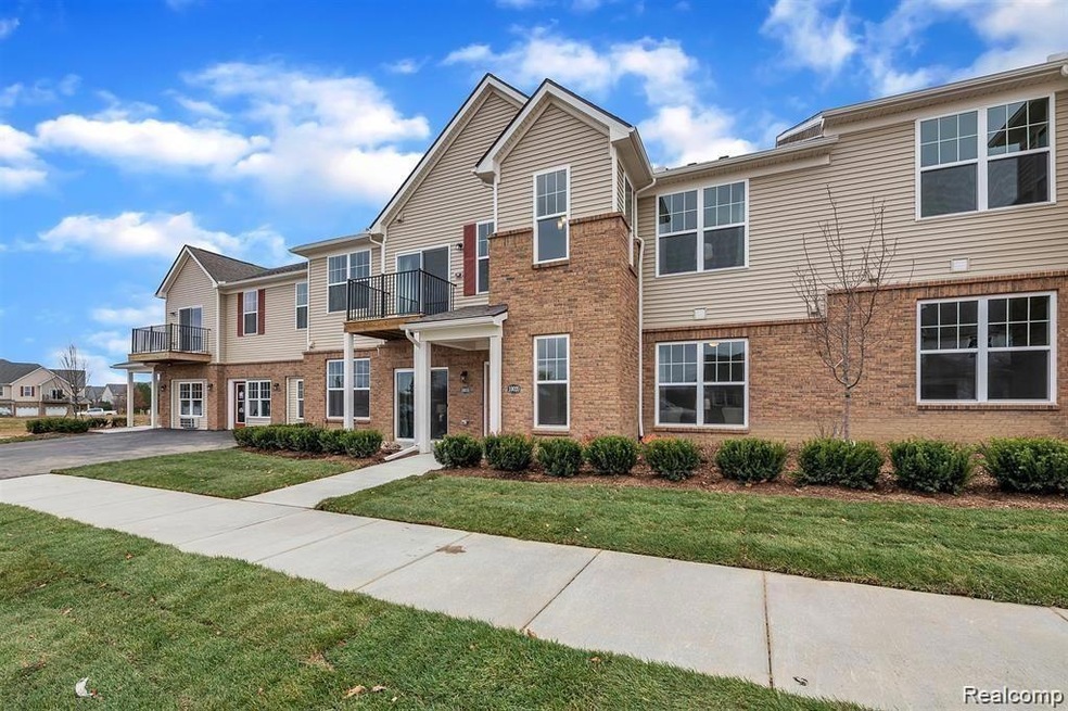 9868 Ridge Run St unit 46, Howell, MI 48855 - photo 1