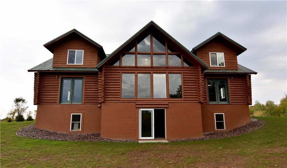 Breathtaking log home living in the peaceful Wisco
