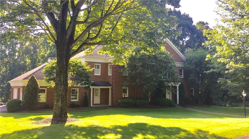 Well maintained brick Colonial on sought after cul