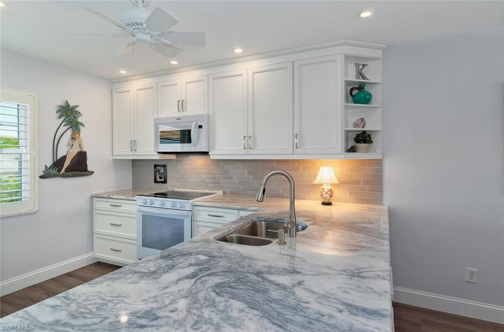 4200 Belair Ln unit 308, Naples, FL 34103 - photo 1