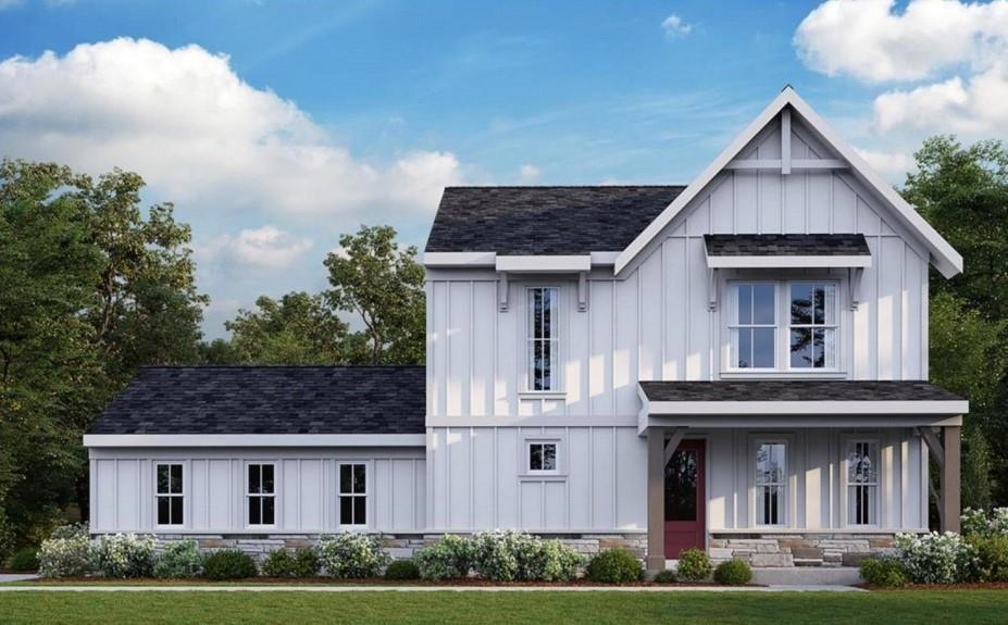 Modern farmhouse with a front yard