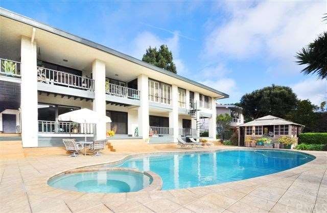 Rear of Home with pool and SOJII house