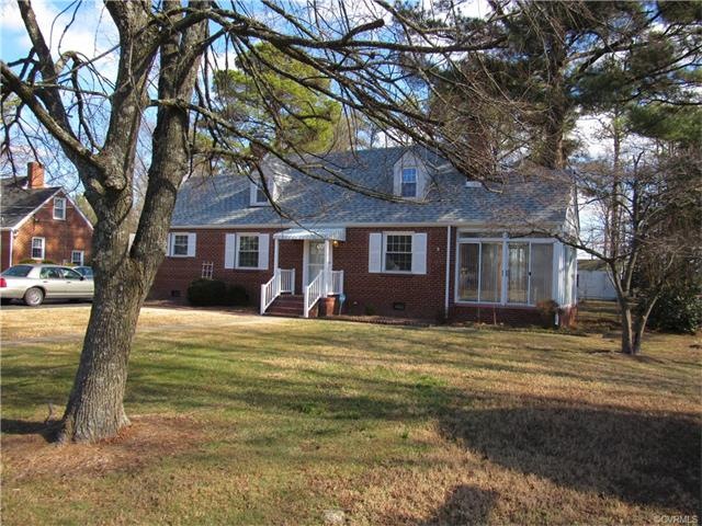 Adorable 4 bedroom cape cod with sun room on 1/2 a