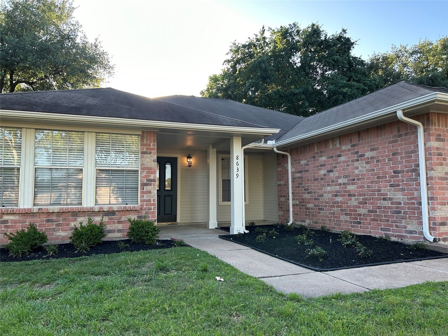 8639 Sunny Ridge Dr, Houston, TX 77095 - photo 1