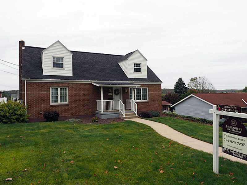 Exterior Front. Charming Brick Cape Cod!