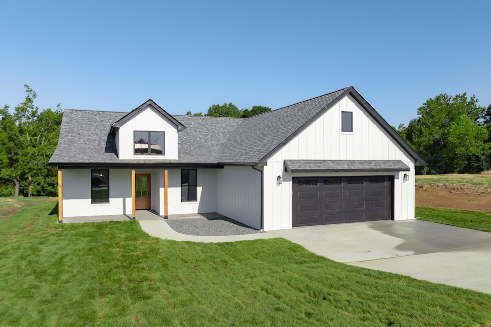 10879 Country Aire Meadows Ct, Holts Summit, MO 65043 - photo 1