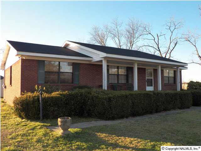 Nice brick home with large covered porch.