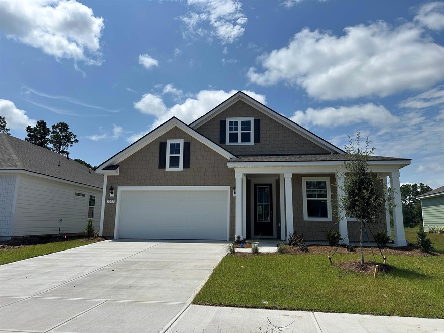 View of front of home featuring a front lawn