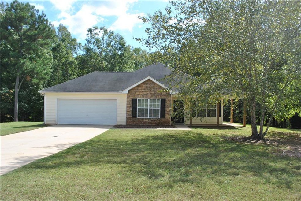 View of front of property featuring a front yard a