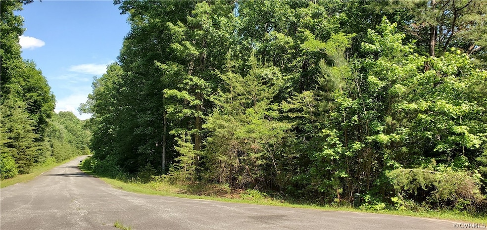 Quiet culdesac setting with mature mix of hardwood