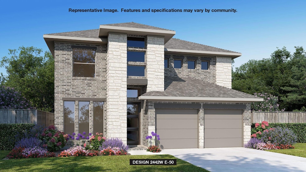 Prairie-style house featuring concrete driveway, 