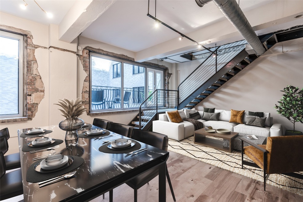 Hardwood floors, and track lighting throughout. Ex