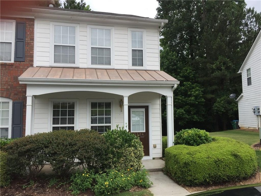Covered Porch with 2 assigned parking spaces in fr