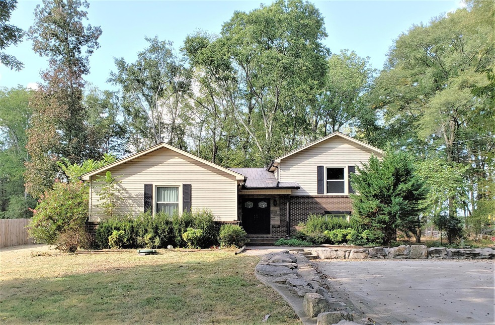Welcome to 2088 Kidd Rd! Driveway leads up to home with extra parking for quests!