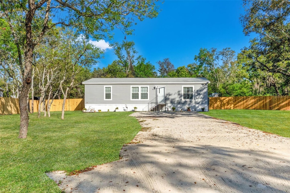 Front view w/ newly installed fencing