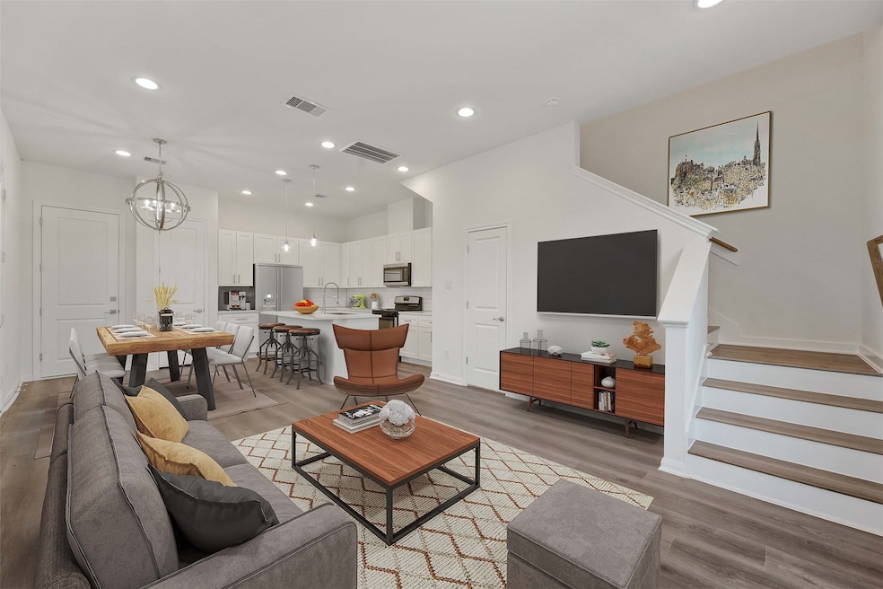 Bottom floor open concept living photo is virtuall