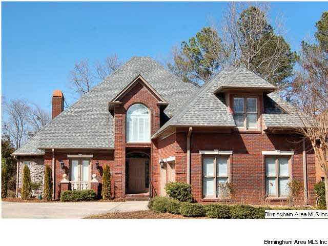 This fabulous four bedroom, 3 1/2 bath all brick h