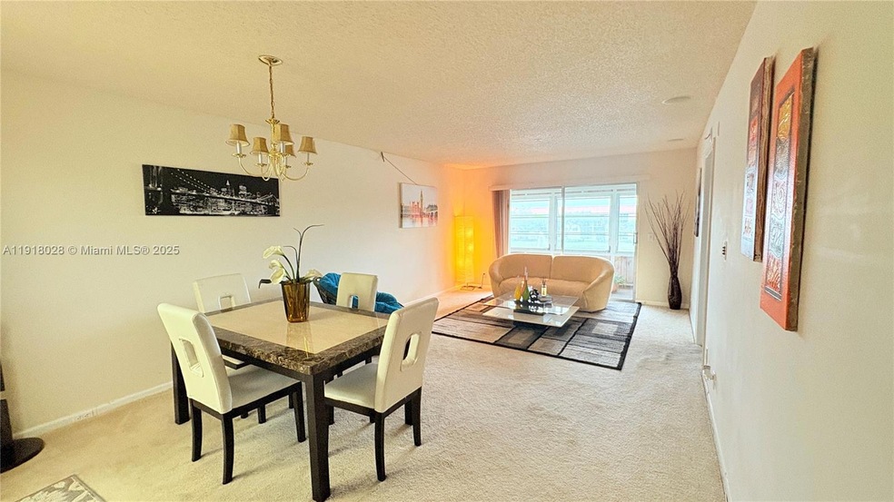 12900 SW 13th St unit E413, Pembroke Pines, FL 33027 - photo 1