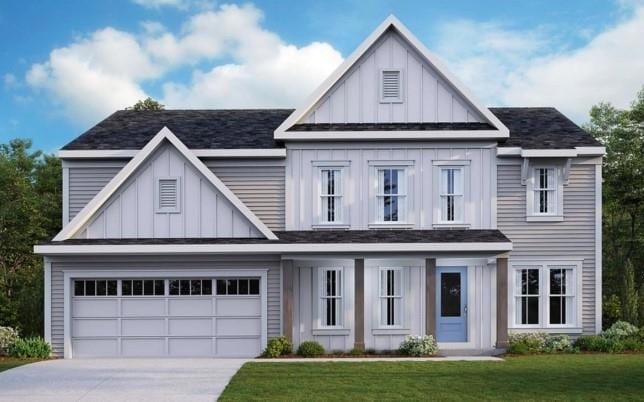 Modern inspired farmhouse featuring board and batten siding, driveway, an attached garage, a front lawn, and roof with shingles