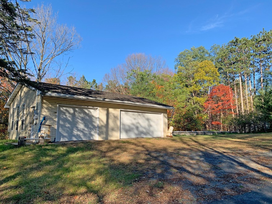 .48-acre city lot with 3-car garage