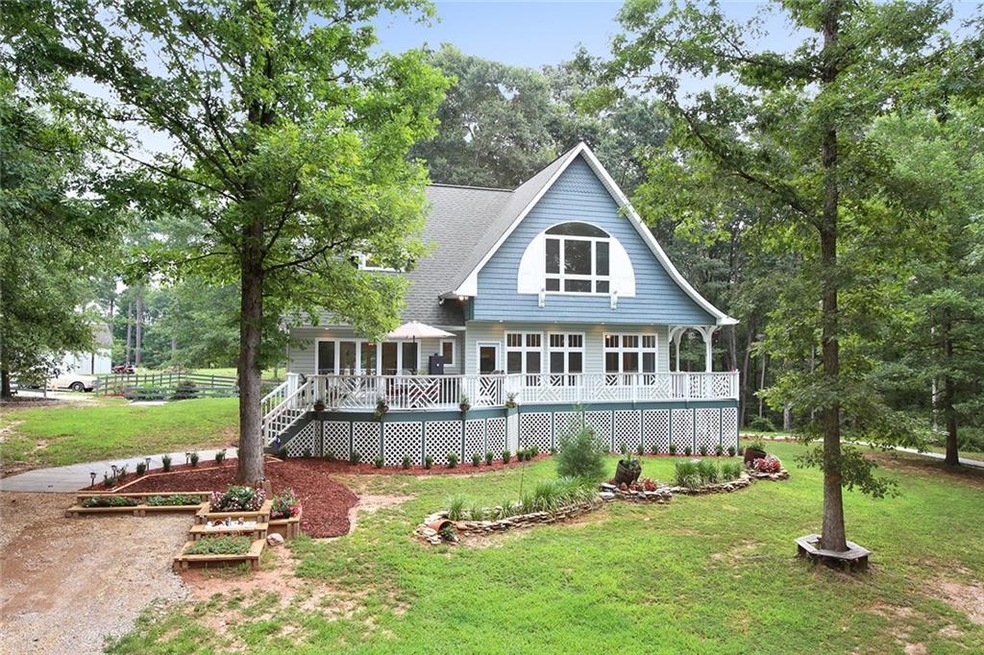 Side of home with wrap around porch. Enjoy sitting