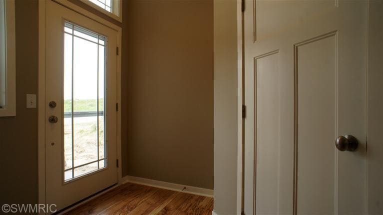 1217 Kingman Ct SW, Byron Center, MI 49315 - photo 1