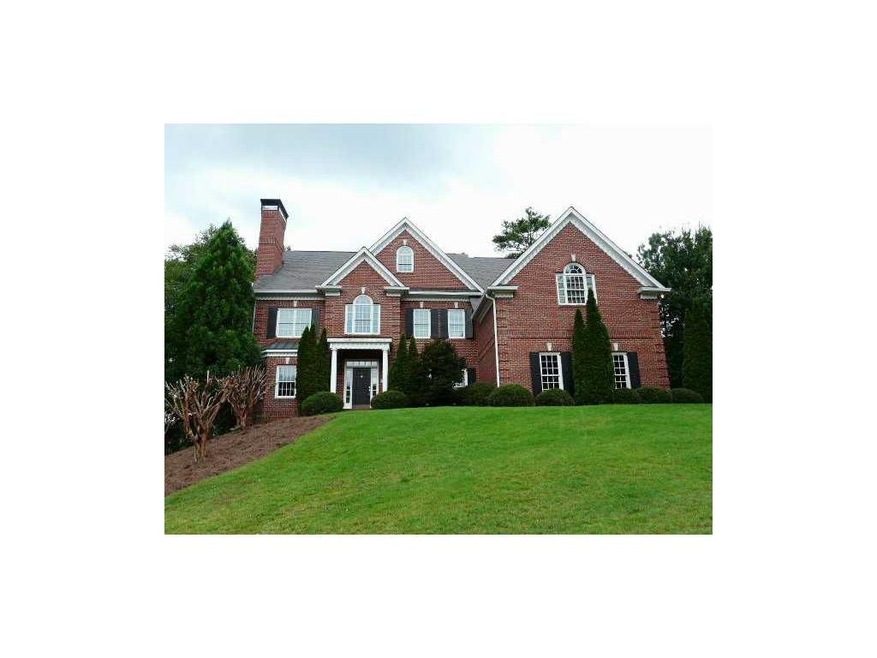 Exterior Front. Grand Four Sided Brick Home