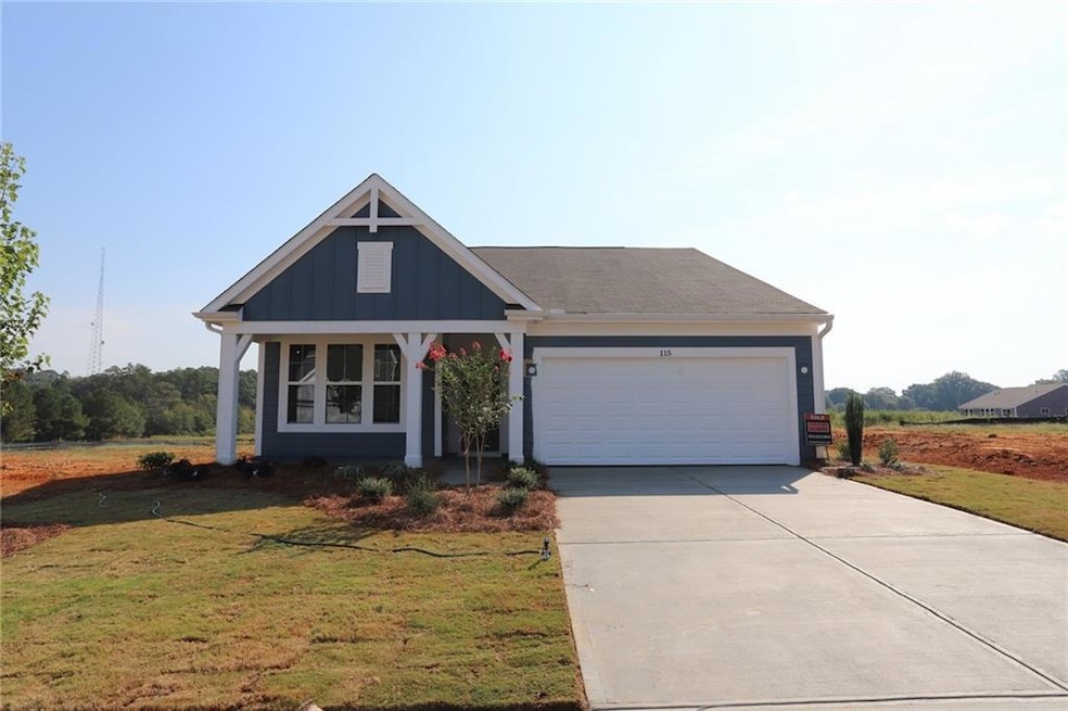 View of front of home featuring a front lawn and a
