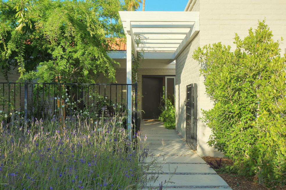 Tree lined path to front entry patio