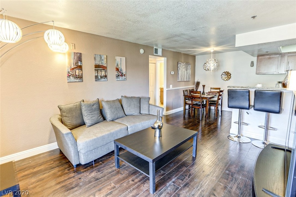 Enter into Living Room with newer laminate floorin