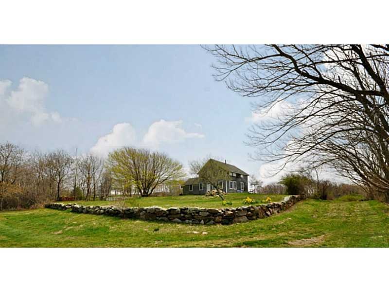 Exterior Front. House enclosed by garden wall