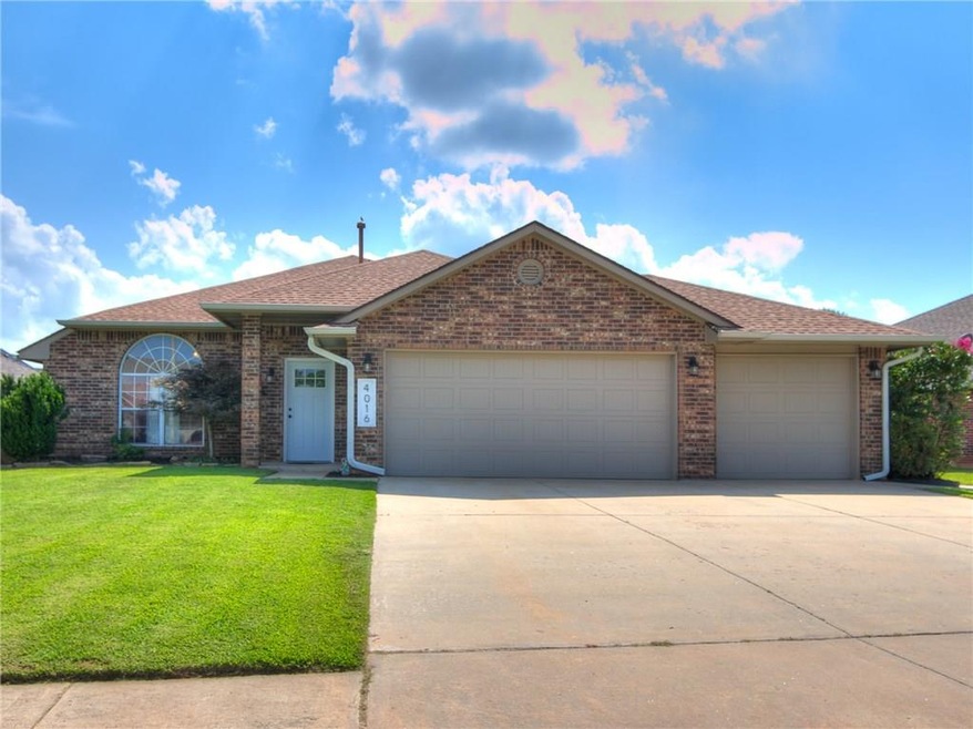 4016 Gyrfalcon Dr, Norman, OK 73072 - photo 1