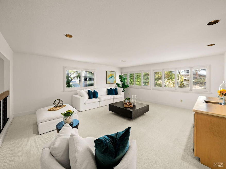 This home has a very large media room up stairs with a wet bar