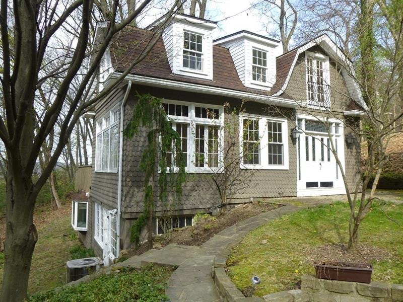 Privately sited on a level to gently rolling lot, 